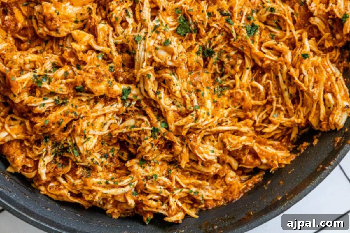 shredded chicken tinga in a pan