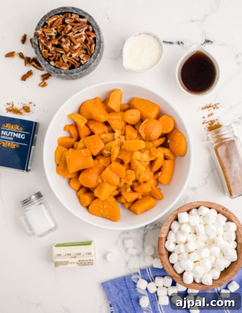Golden Sweet Potato Delight 4 sweet potatoes, marshmallows, vanilla, salt, butter, pecans, laid out