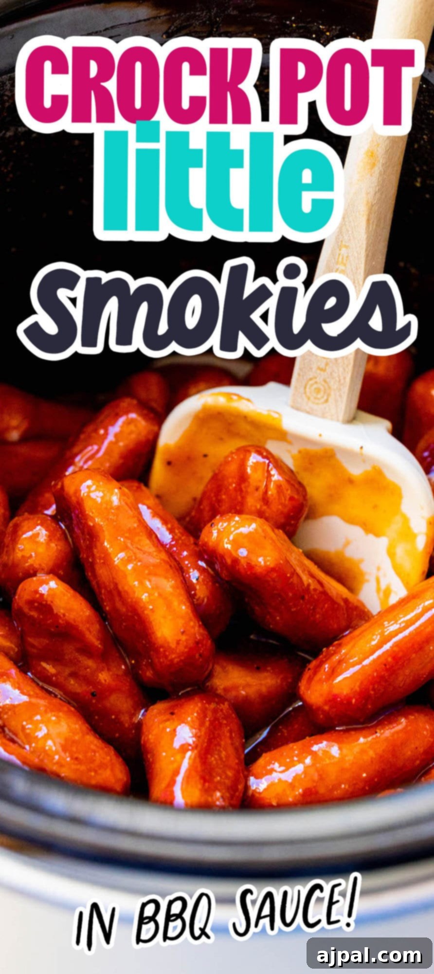 little smokies in bbq sauce in a blue bowl in front of a crock pot on a table