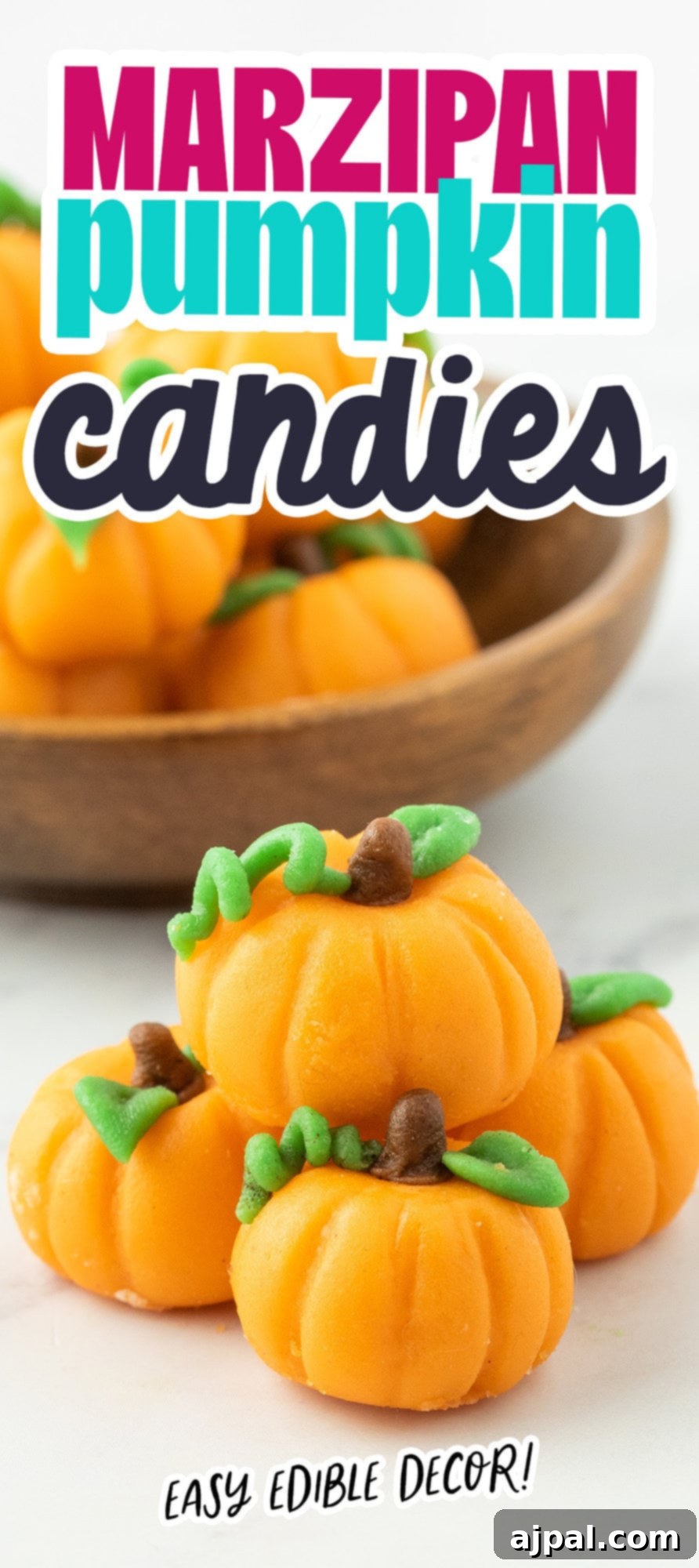 marzipan pumpkin with stem and leaf on a table