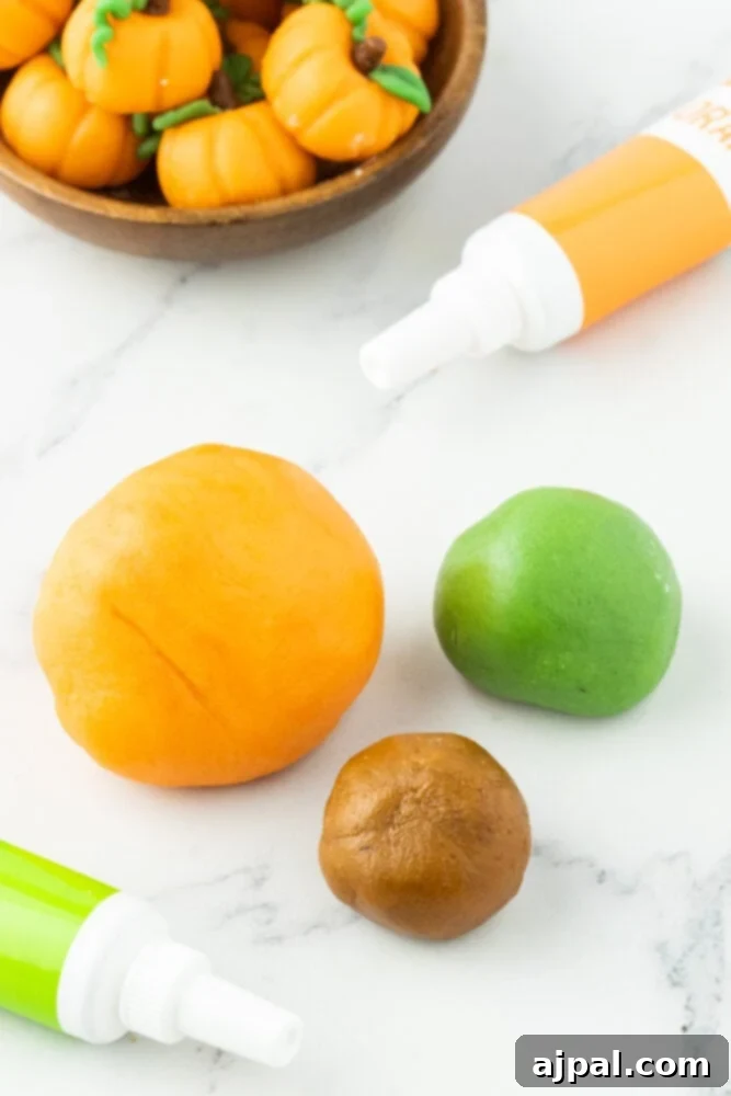orange, brown, and green marzipan rolled into balls