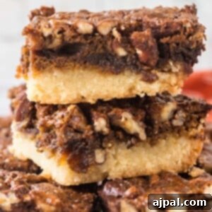 Pecan Pie Bars 15 pecan pie bar stacked on top of each other