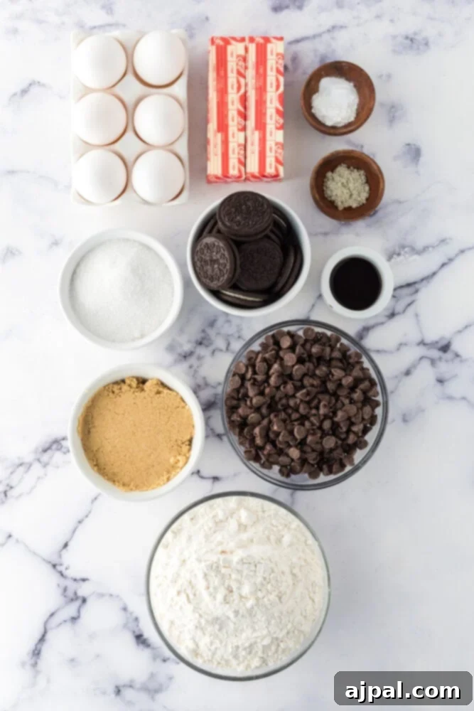 Decadent Oreo Bars 6 Easy recipe for baked cookie bars stuffed with Oreos on a marble table.