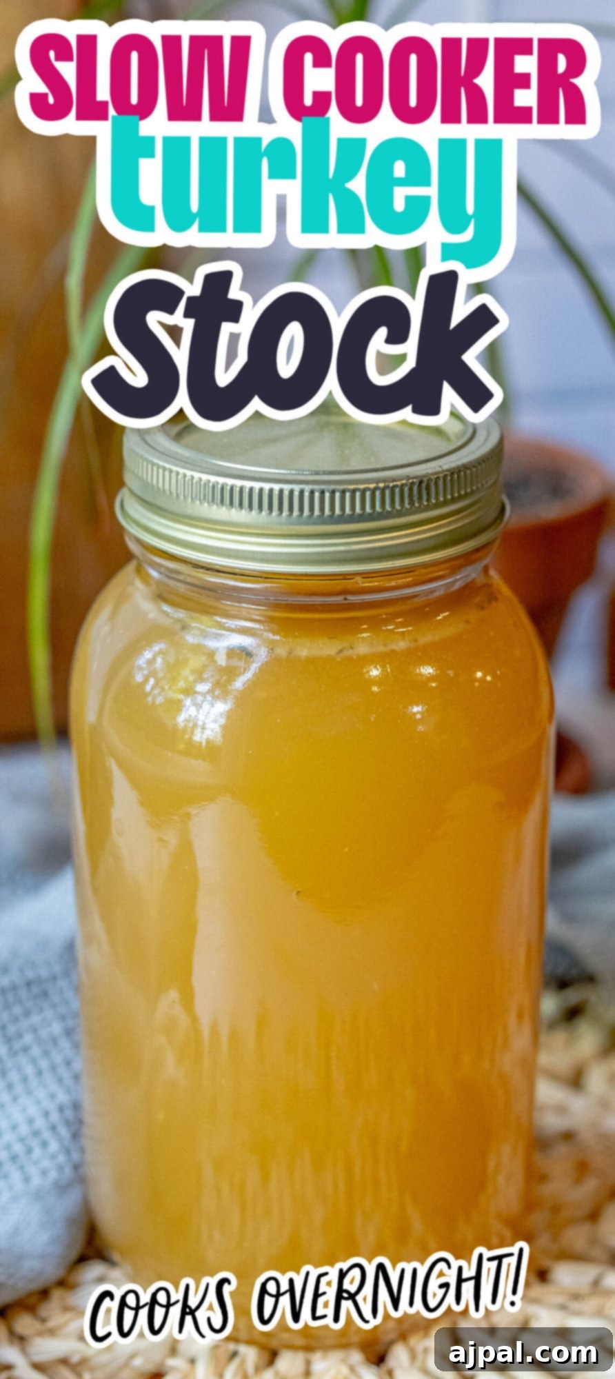 Homemade Slow Cooker Turkey Stock 10 A jar of golden slow cooker turkey stock, showcasing its rich color and homemade goodness.