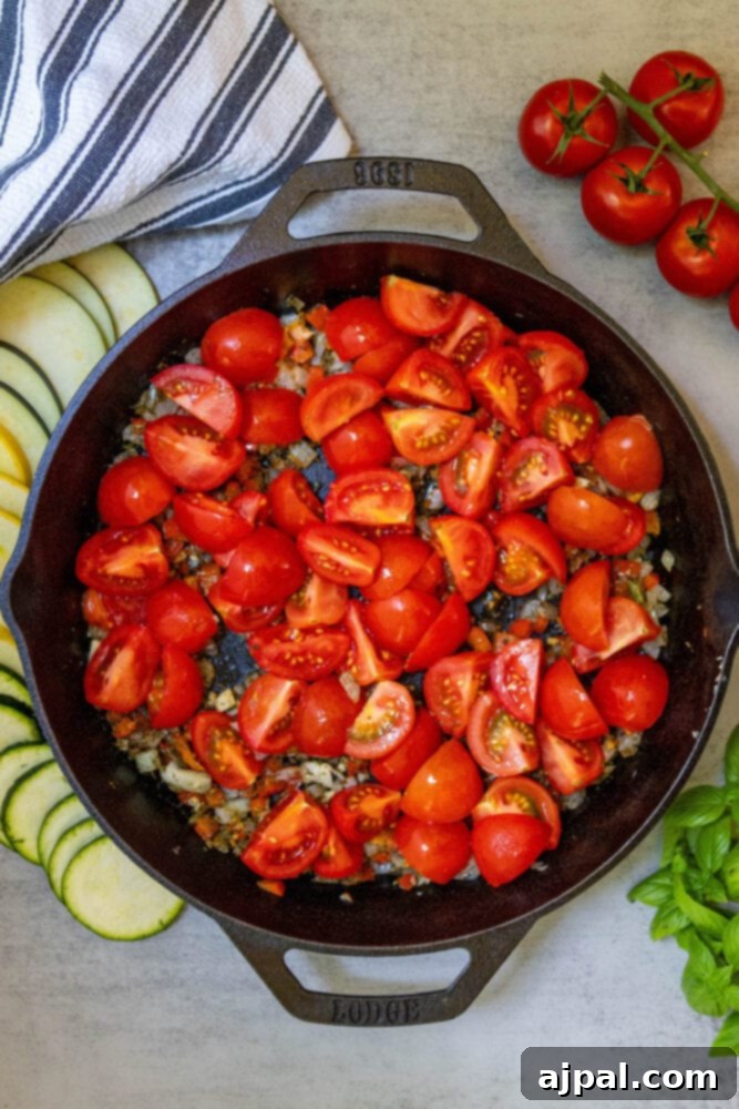 herbs, onions, and tomatoes in a pan