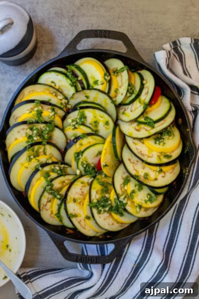 squash and eggplant layered over sautéed tomatoes