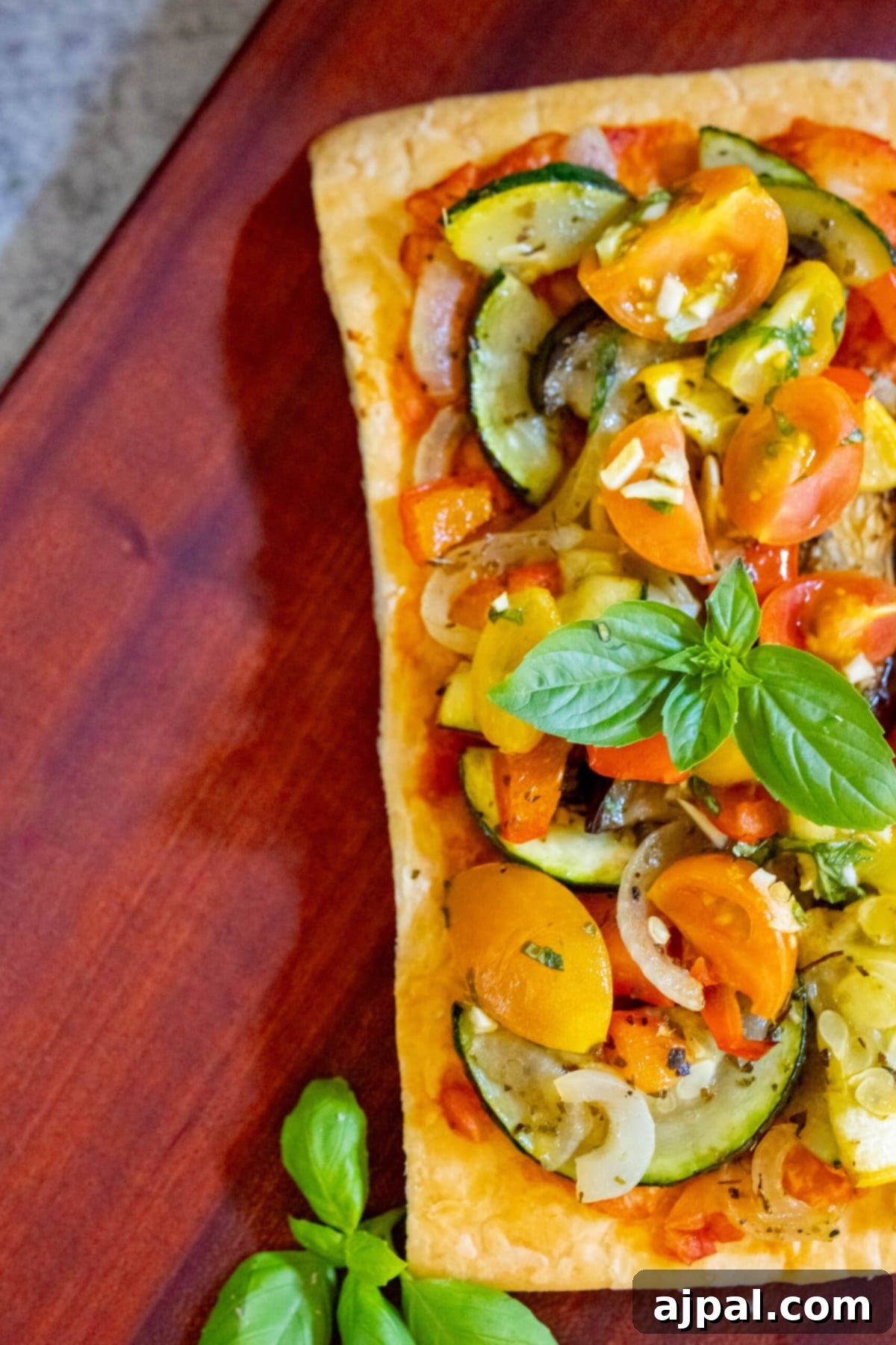 Ratatouille Tartlets 2 baked tarts with ratatouille on top on a table