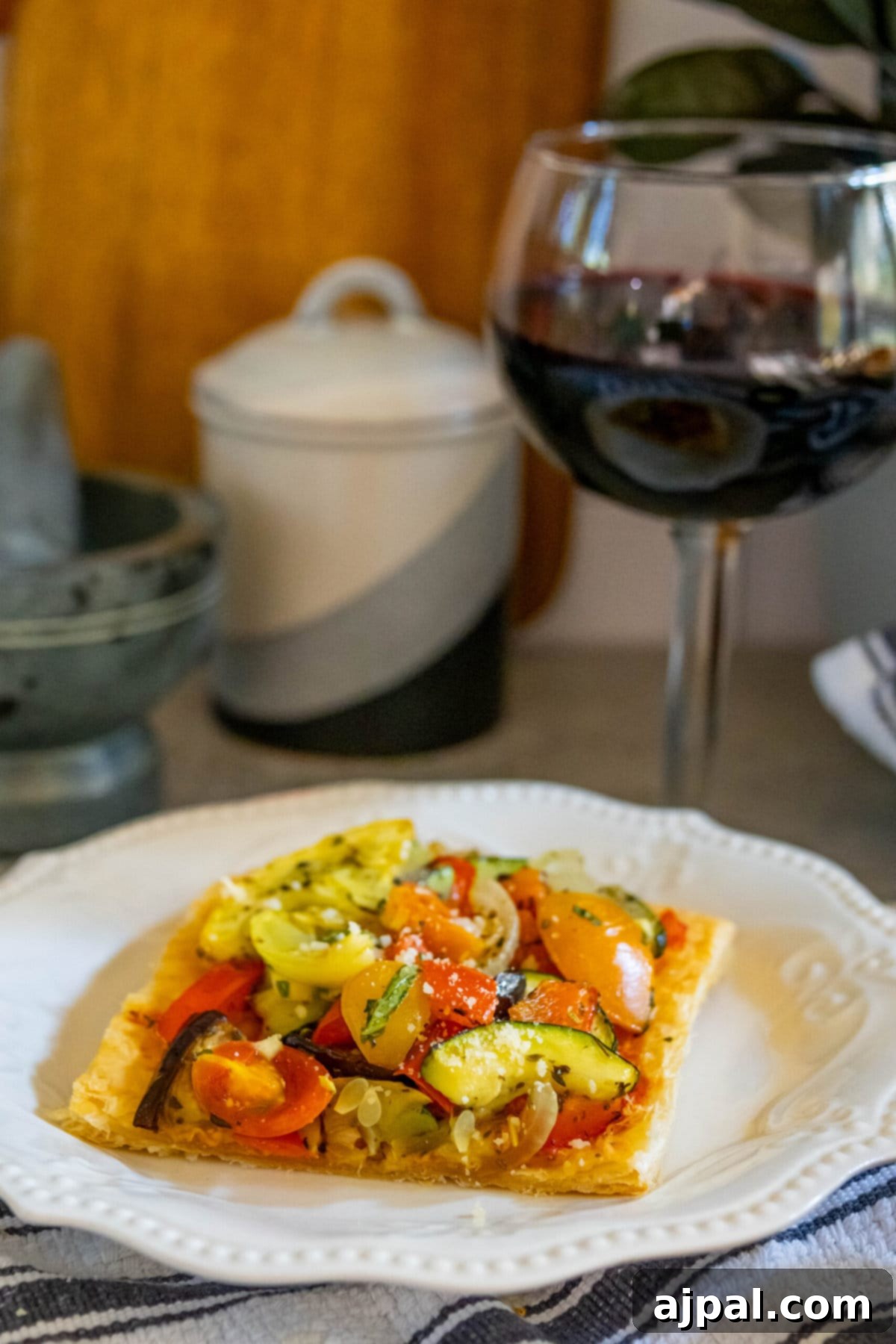 Ratatouille Tartlets 3 baked tarts with ratatouille on top on a table