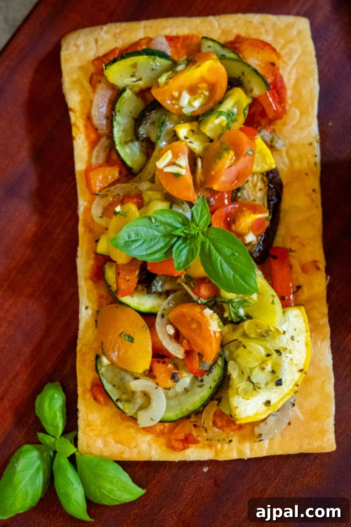 Ratatouille Tartlets 4 baked tarts with ratatouille on top on a table