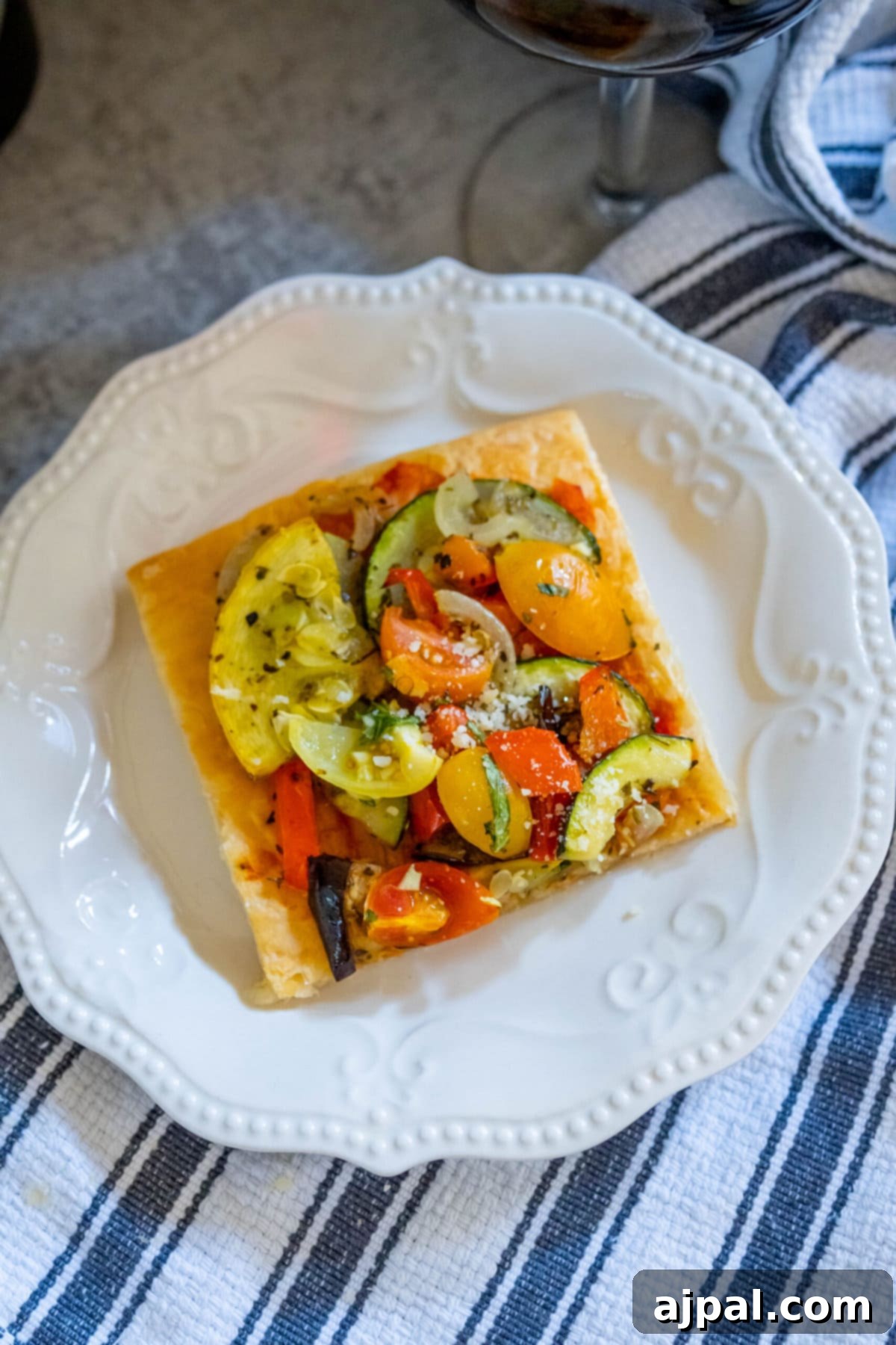 Ratatouille Tartlets 9 baked tarts with ratatouille on top on a table