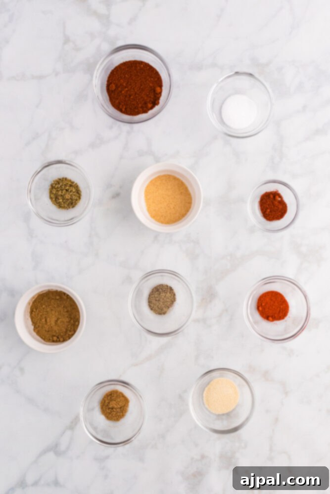 Flavorful Taco Blend 5 herbs and seasonings in small bowls on a table