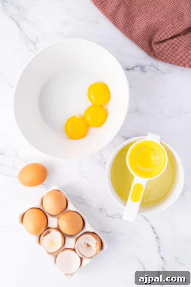 Your Instant Pot's Secret to Perfect Creme Brulee 5 egg yolks and sugar being added to a bowl
