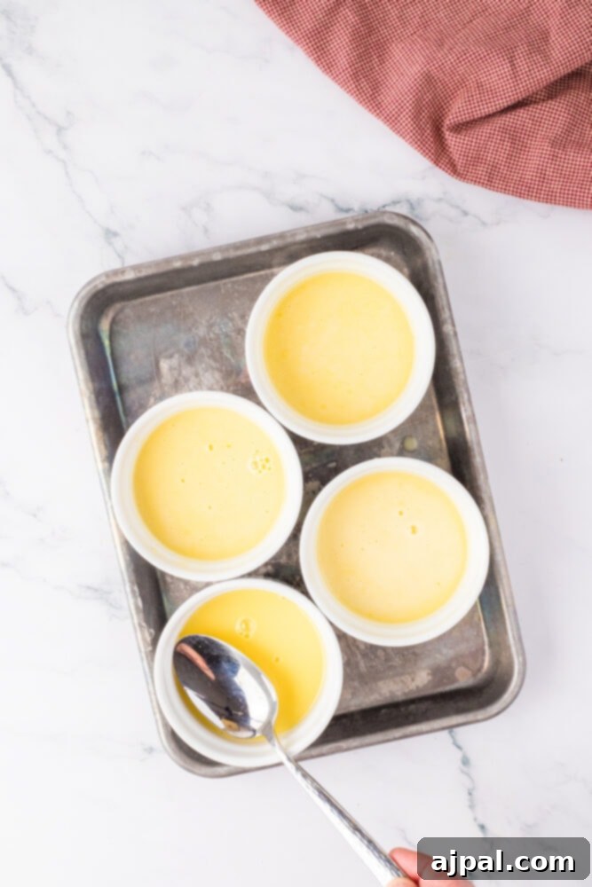 Your Instant Pot's Secret to Perfect Creme Brulee 10 custard being poured into ramekins