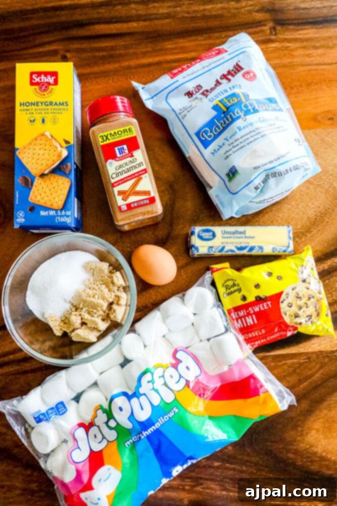 Gluten-Free S'mores Cookies 4 Gluten-free ingredients for s’mores dessert are laid out on a table.