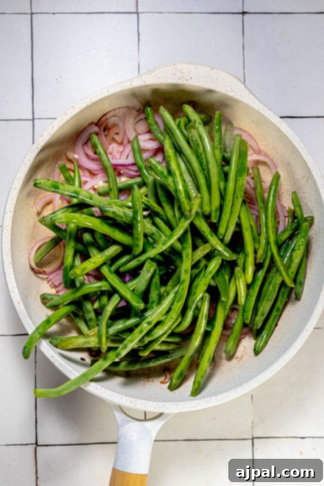 Sautéed green beans and onions.