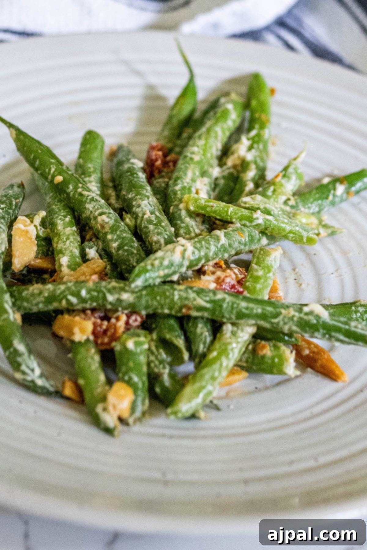Sun-Dried Tomato & Parmesan Green Beans 3 Cheesy Green Beans with almonds and tomatoes