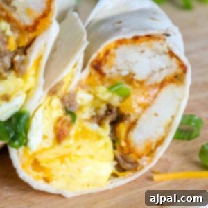 A freezer breakfast burrito with eggs and cheese on a cutting board.