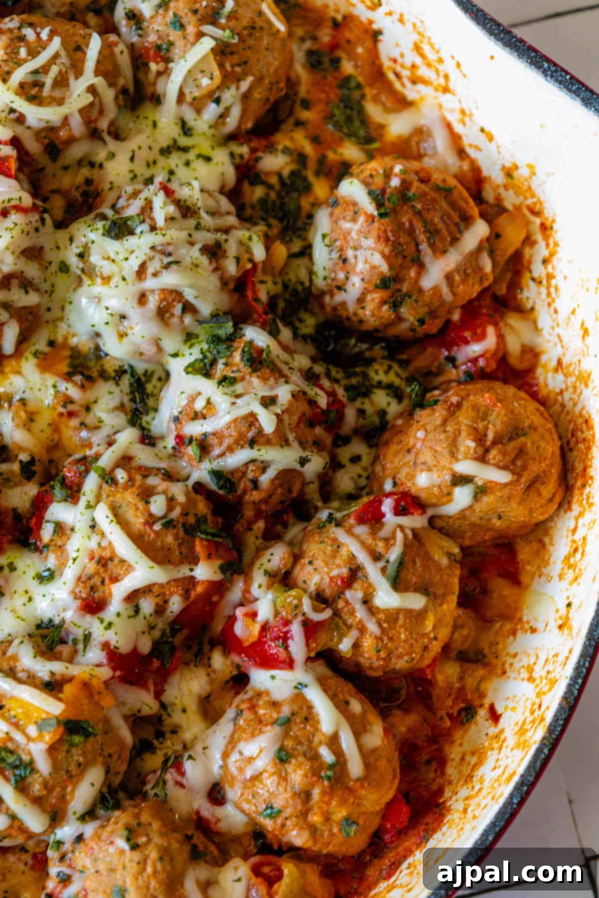Italian Meatball Skillet Melt 12 A Cheesy Italian Meatball Skillet filled with vegetables.