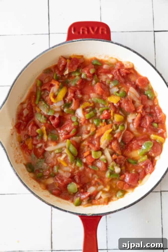 Italian Meatball Skillet Melt 8 A Cheesy Italian Meatball Skillet filled with tomatoes and peppers.