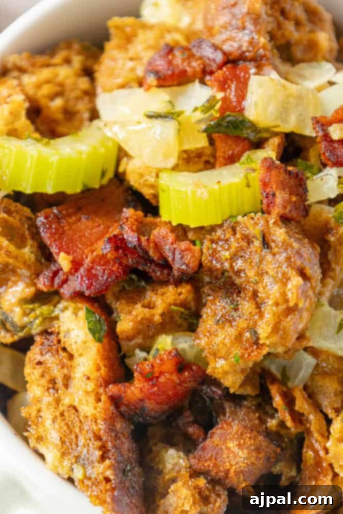 Hearty Bacon Rye Stuffing 2 A bowl of bacon stuffing with onions and celery.