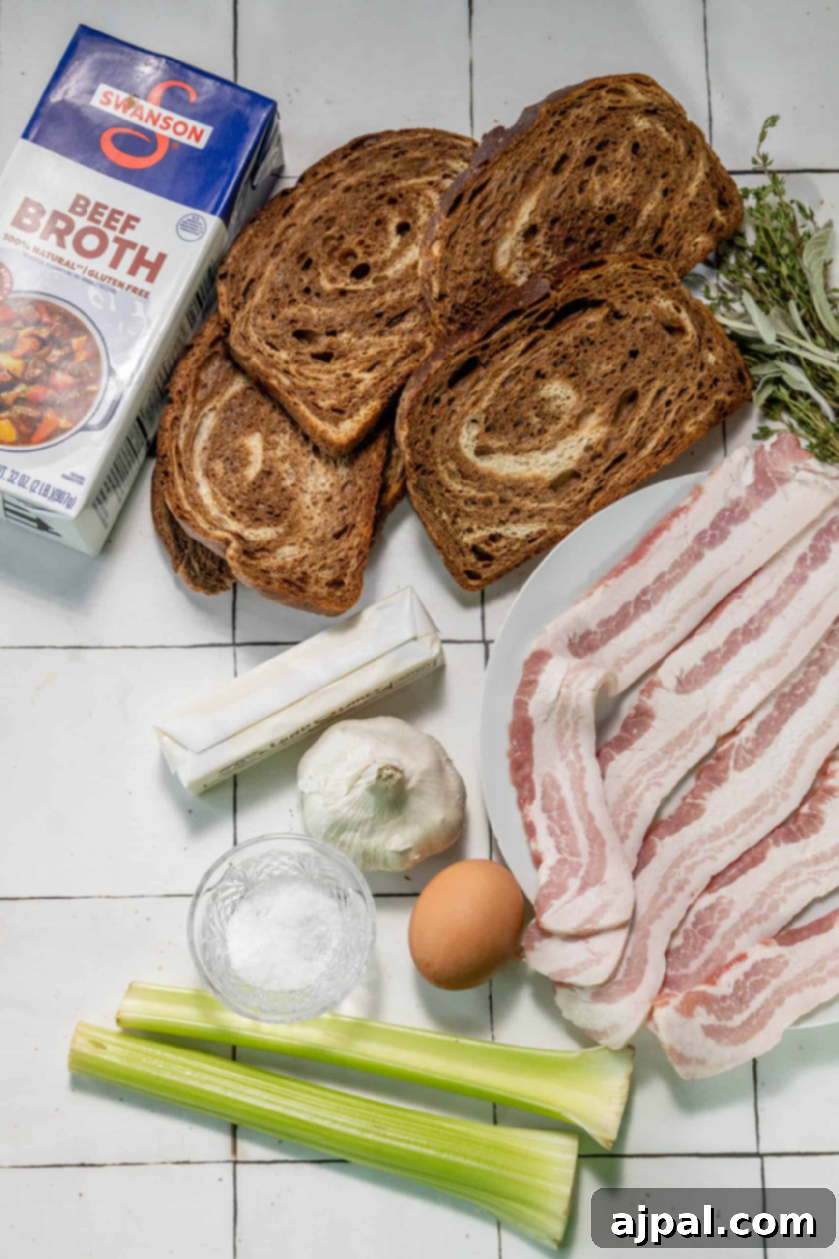 Hearty Bacon Rye Stuffing 6 Bacon and bread on a tiled floor.