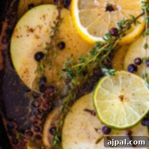 Slow Cooker Christmas Potpourri 9 A crockpot filled with apples, lemons and thyme.