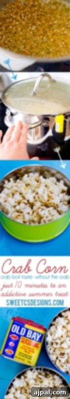 A person's hand sprinkling Old Bay seasoning over a fresh batch of popcorn in a pan, with a bowl of finished crab corn in the background.