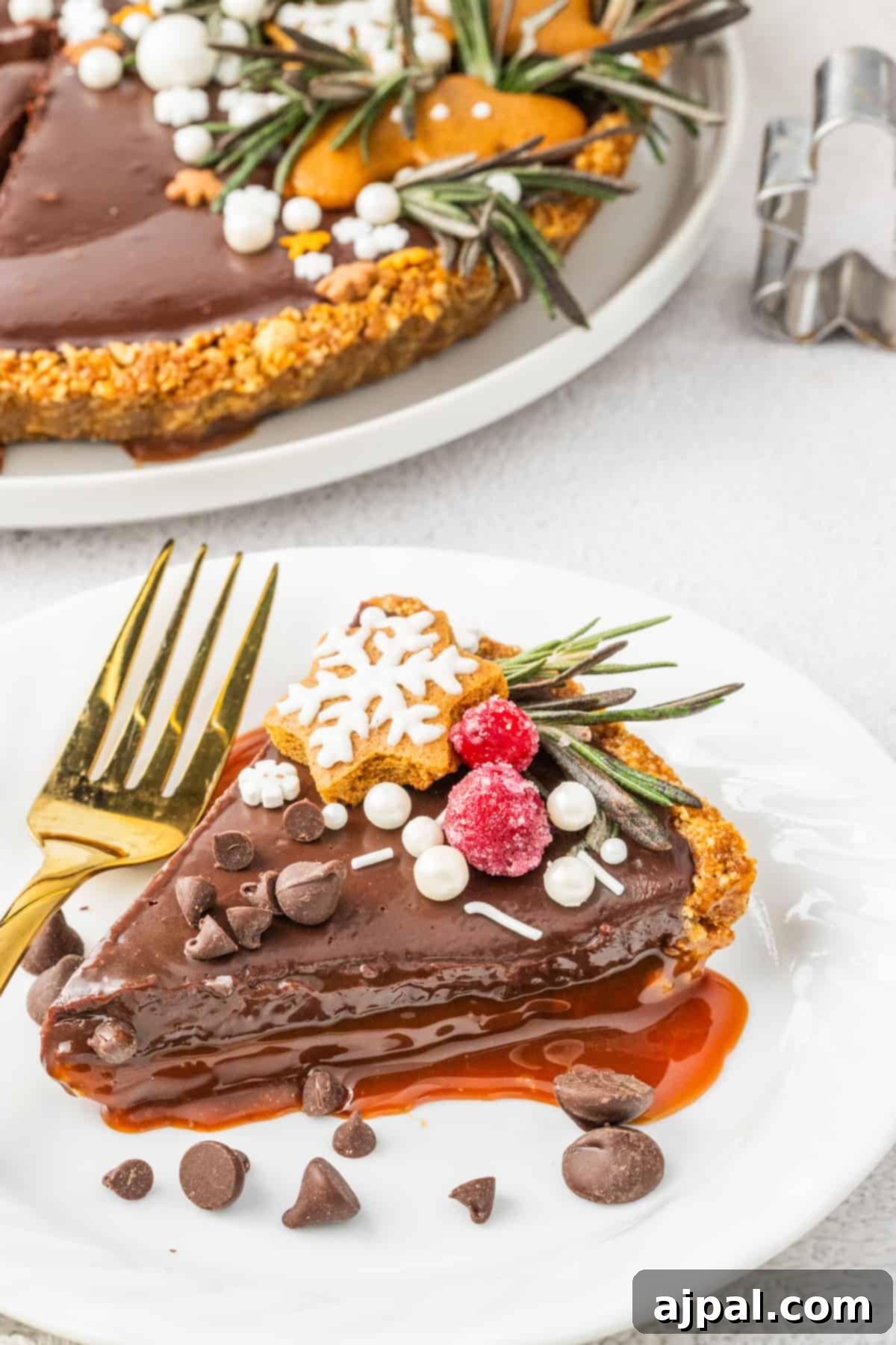 A generous slice of delectable chocolate caramel tart rests on a plate, ready to be enjoyed.