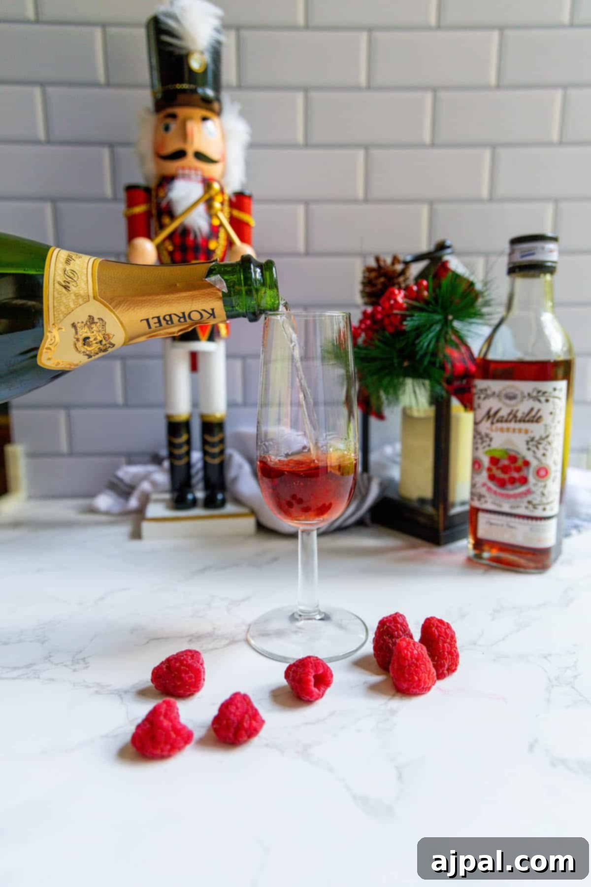 Raspberry Champagne Glow 6 A perfectly poured glass of sparkling raspberry champagne, capturing the effervescence and vibrant color, ready to be enjoyed.
