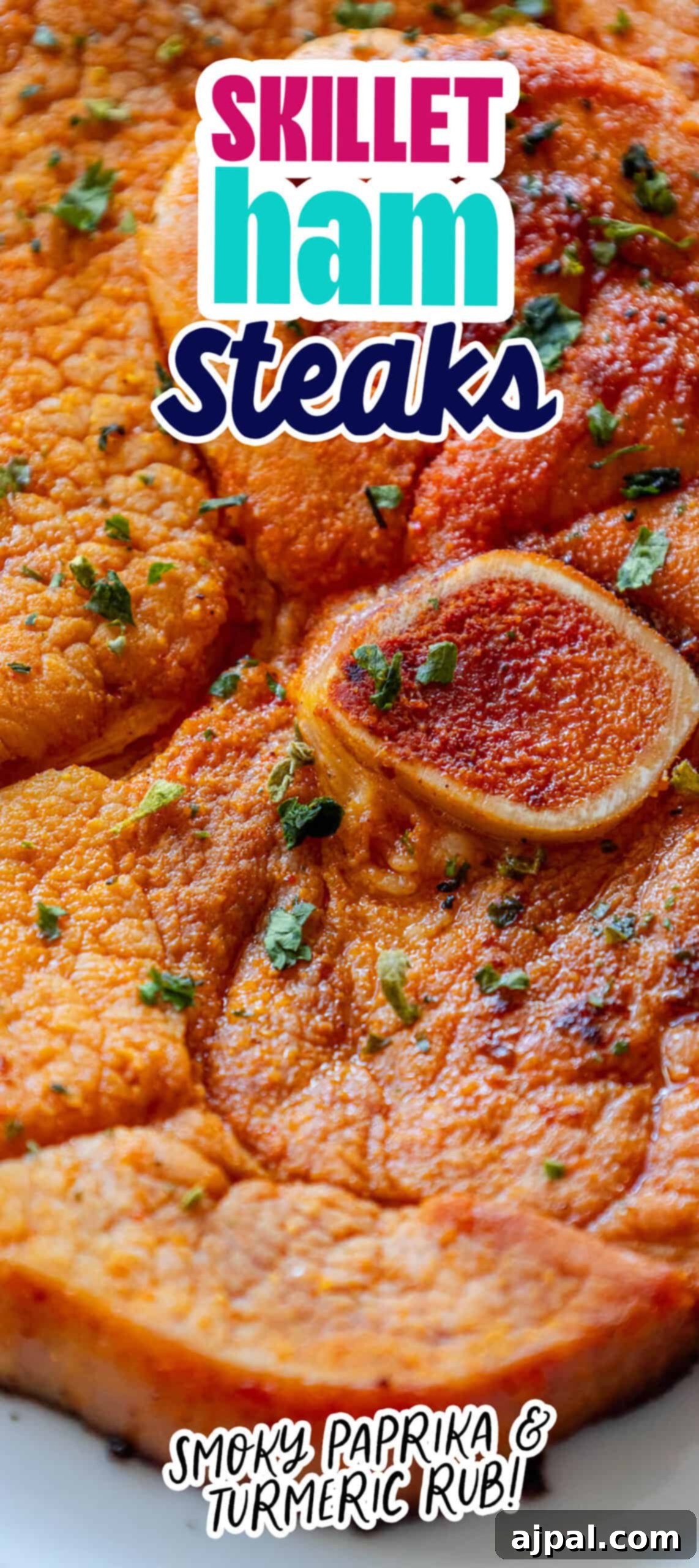 A plate with skillet ham steaks on it.