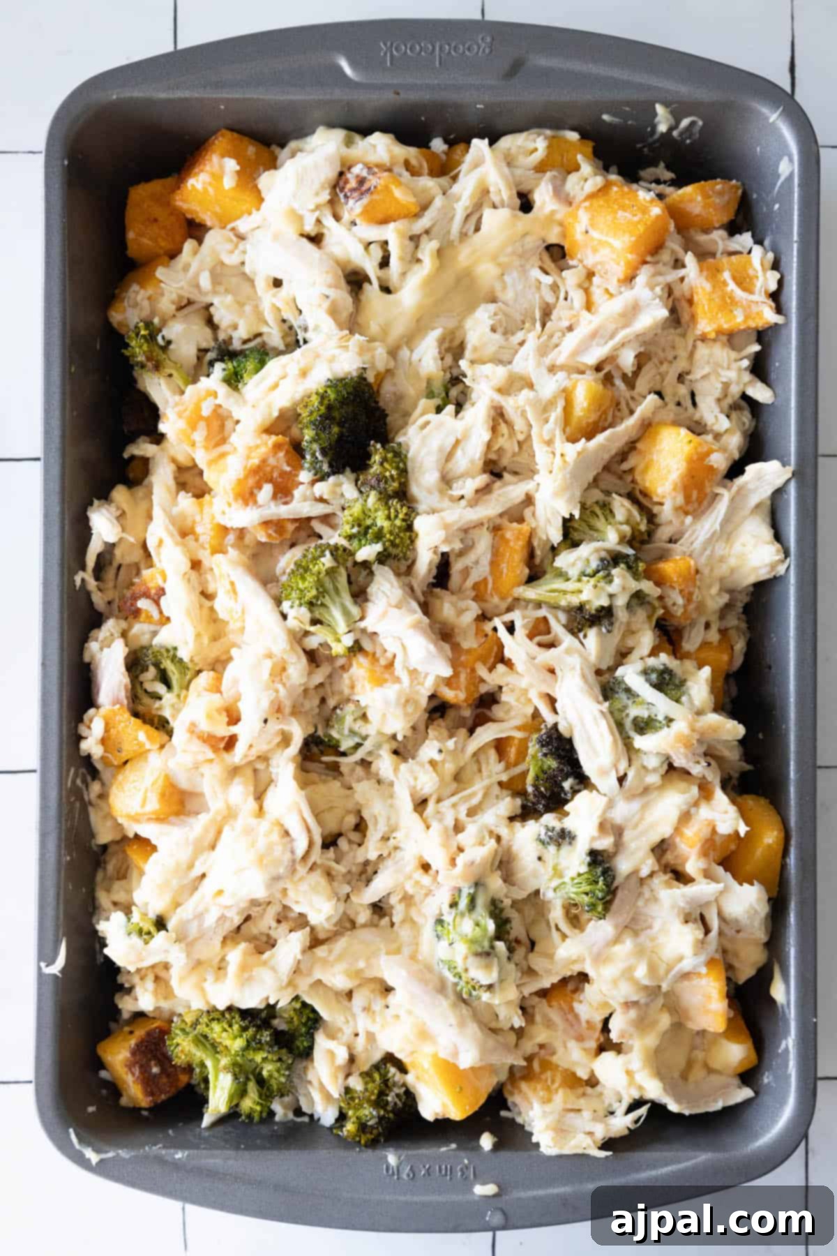 A close-up of the chicken casserole, showcasing the tender chicken, vibrant broccoli, and creamy sauce.