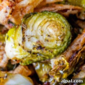 Caramelized Brussels Sprouts and Sweet Onions 9 A close up of roasted Brussels sprouts and onions.