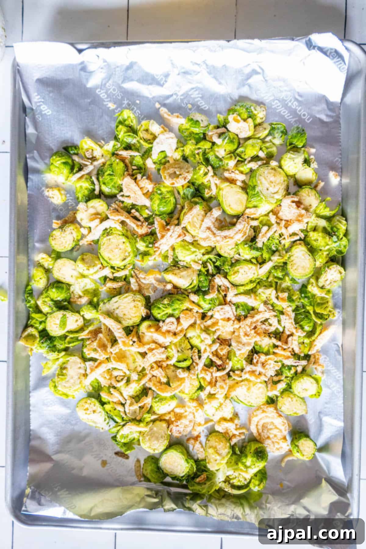Caramelized Brussels Sprouts and Sweet Onions 5 Roasted Brussels sprouts on a baking sheet.