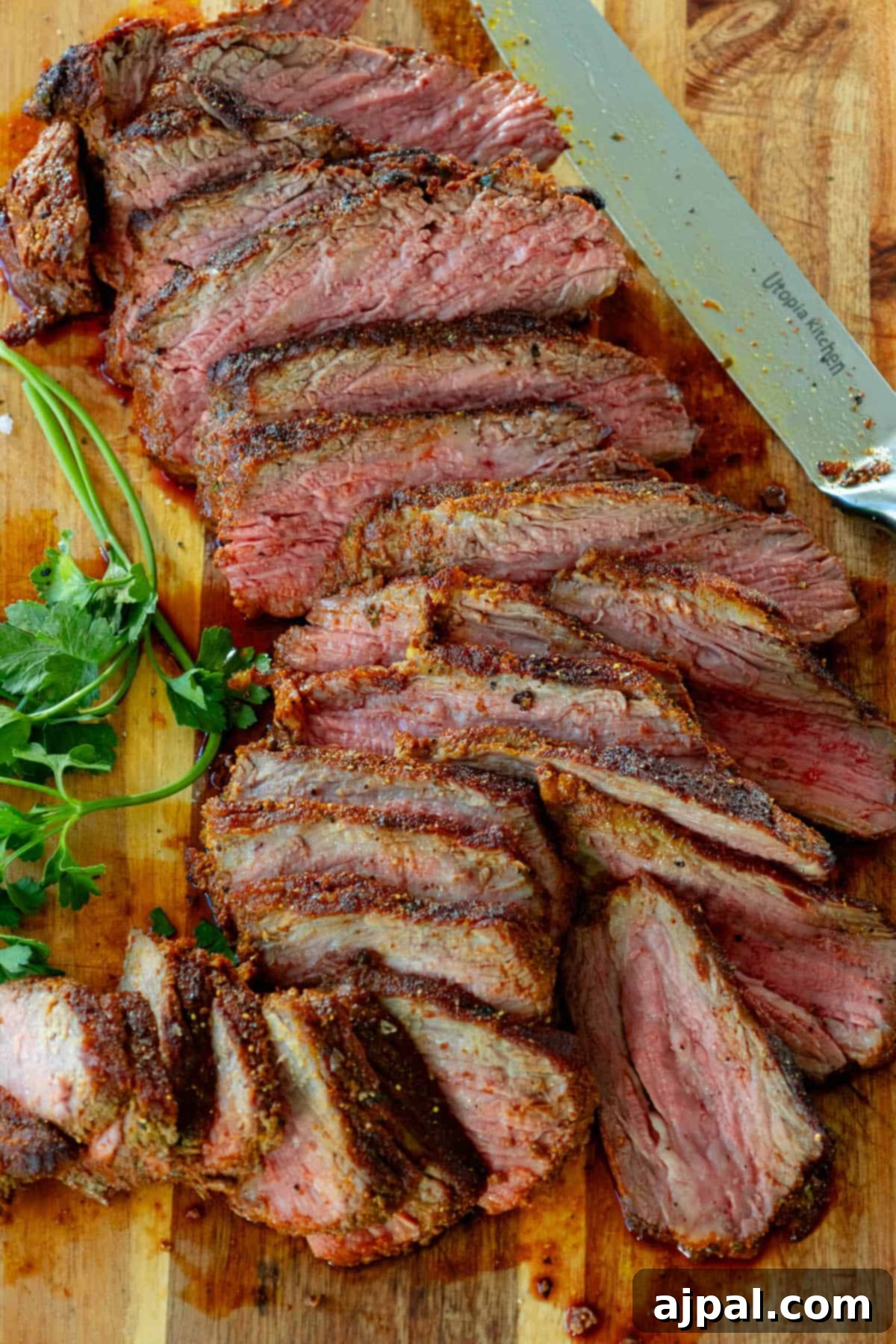 A succulent tri-tip steak, cooked to perfection using the reverse seared technique, showcased on a cutting board.