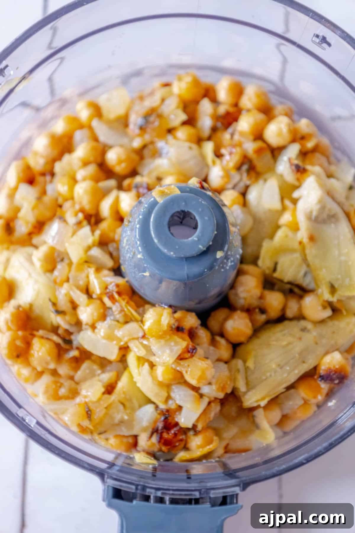 Roasted chickpeas in a food processor.