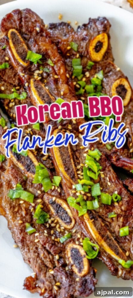 Korean BBQ Galbi Flanken Ribs 11 A perfectly grilled plate of Korean flanken ribs, ready to be enjoyed, garnished with fresh green onions and sesame seeds.