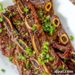 Korean BBQ Galbi Flanken Ribs 12 picture of korean grilled flanken ribs on a plate