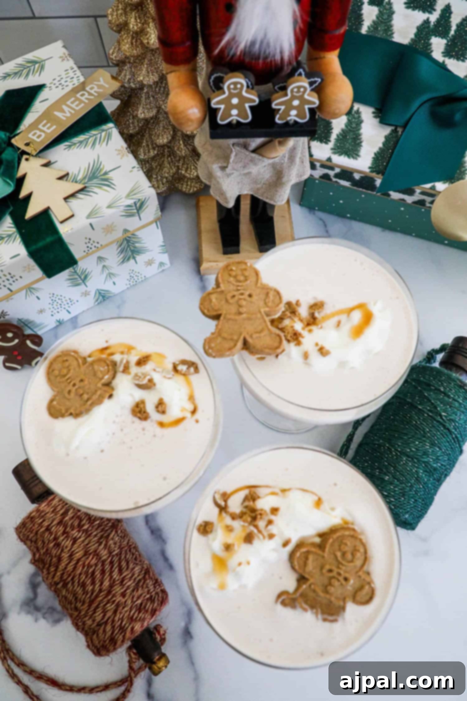 Gingerbread Spice Martini 4 Gingerbread latte with whipped cream and gingerbread cookies atop a gingerbread martini.