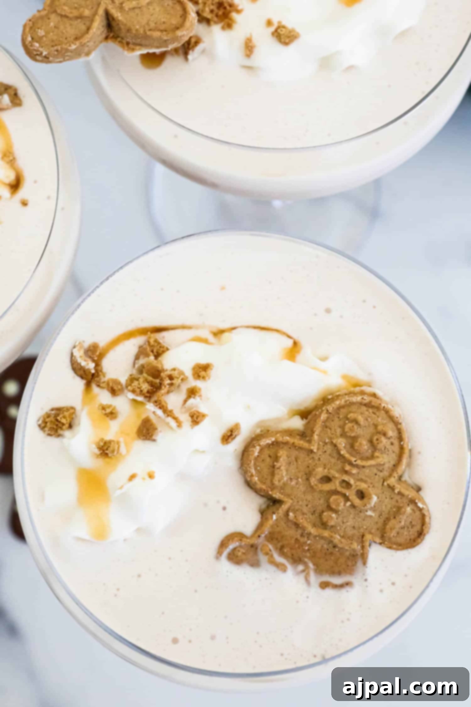 Gingerbread Spice Martini 6 Gingerbread martini with whipped cream and gingerbread cookies. The perfect holiday cocktail, this gingerbread martini is a festive blend of warm spices and rich flavors. Topped with a dollop