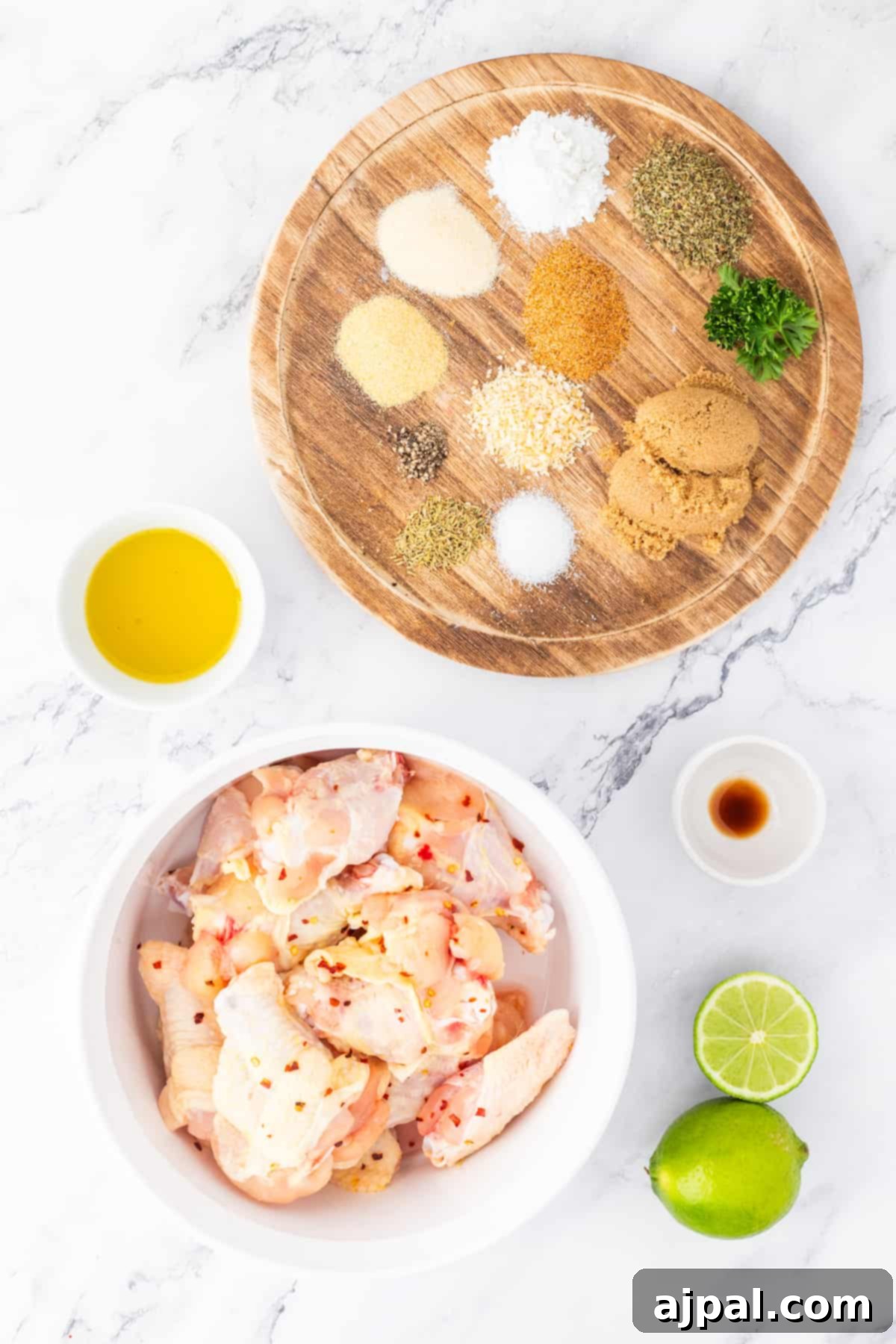 Crispy Air-Fried Wings 5 A delectable bowl of air fryer chicken wings, enhanced with flavorful spices and ingredients, placed elegantly on a stylish marble table.