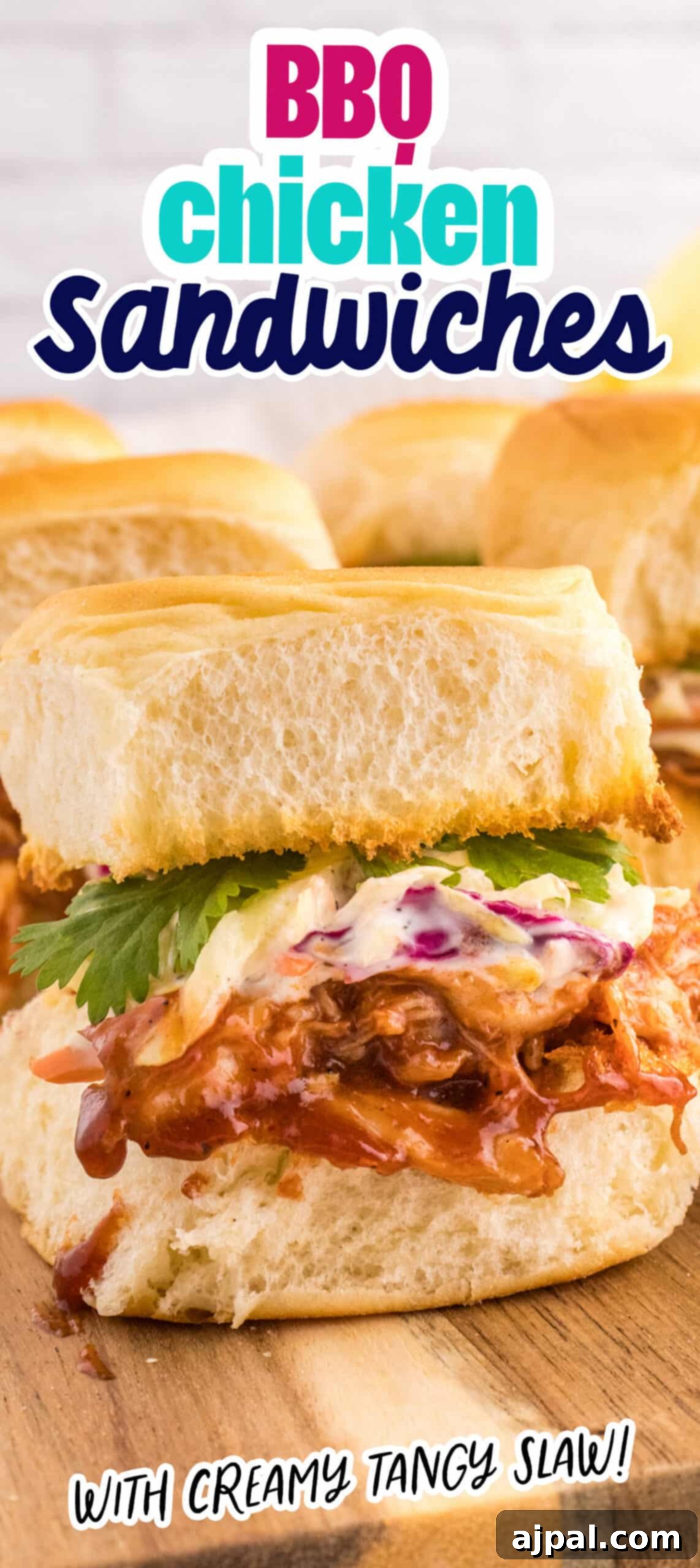 Smoky BBQ Chicken Minis 13 A tall, inviting image of BBQ Chicken Sliders on a wooden board, ready to be enjoyed.