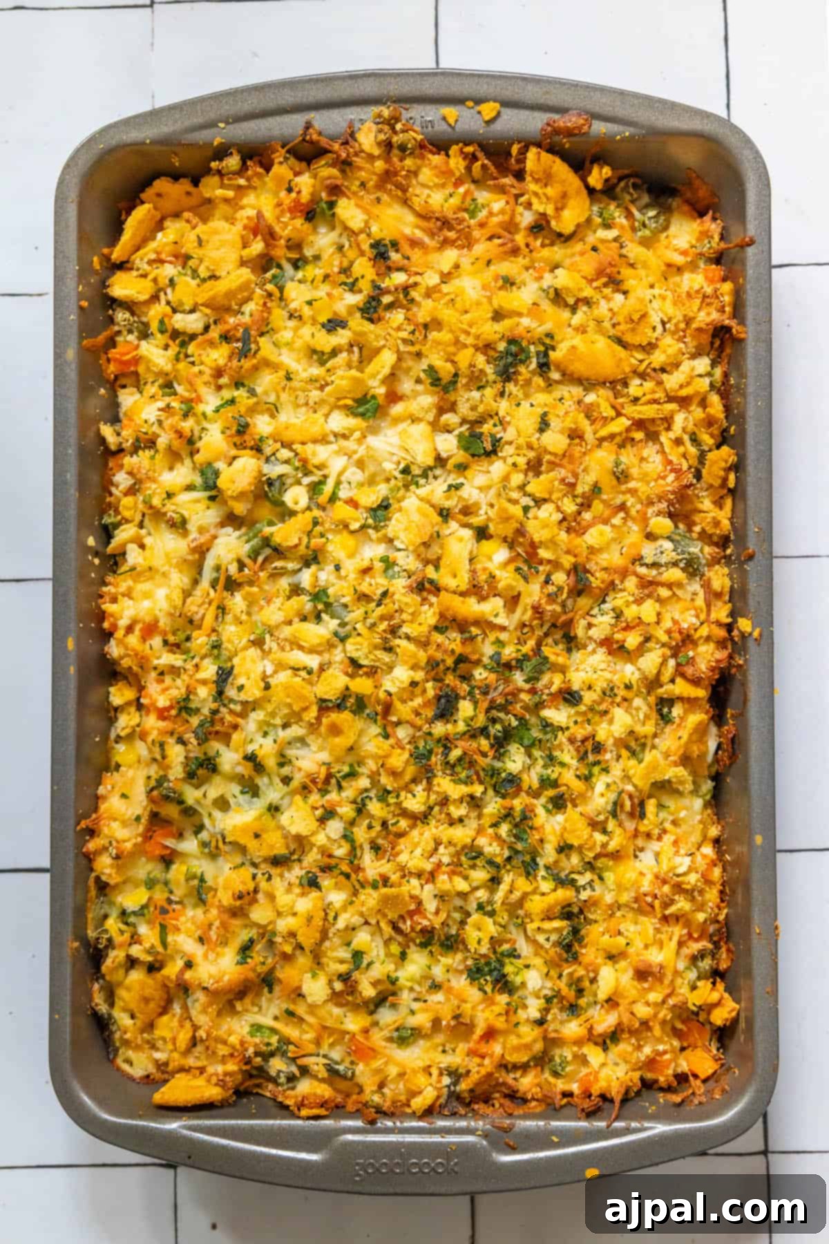A creamy casserole dish filled with vegetables and herbs.