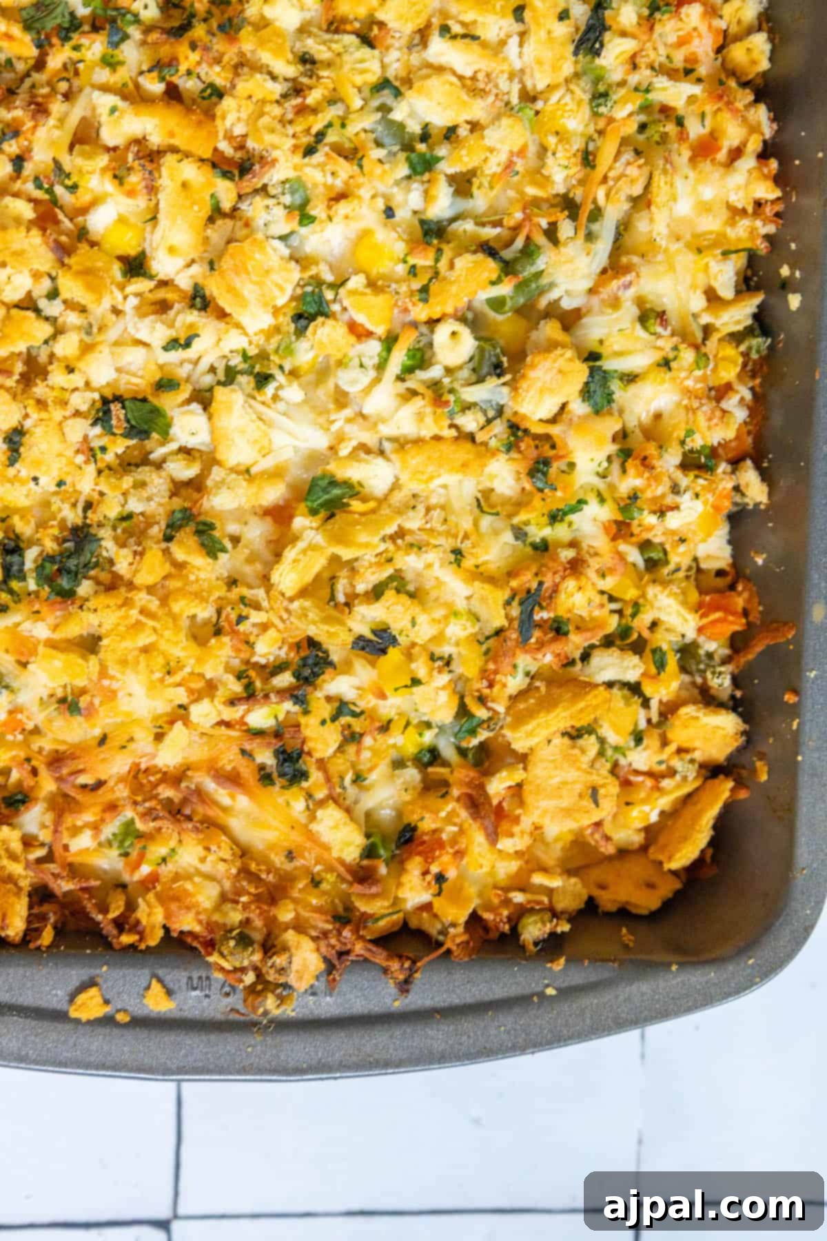 A creamy casserole dish filled with mashed potatoes and cheese.