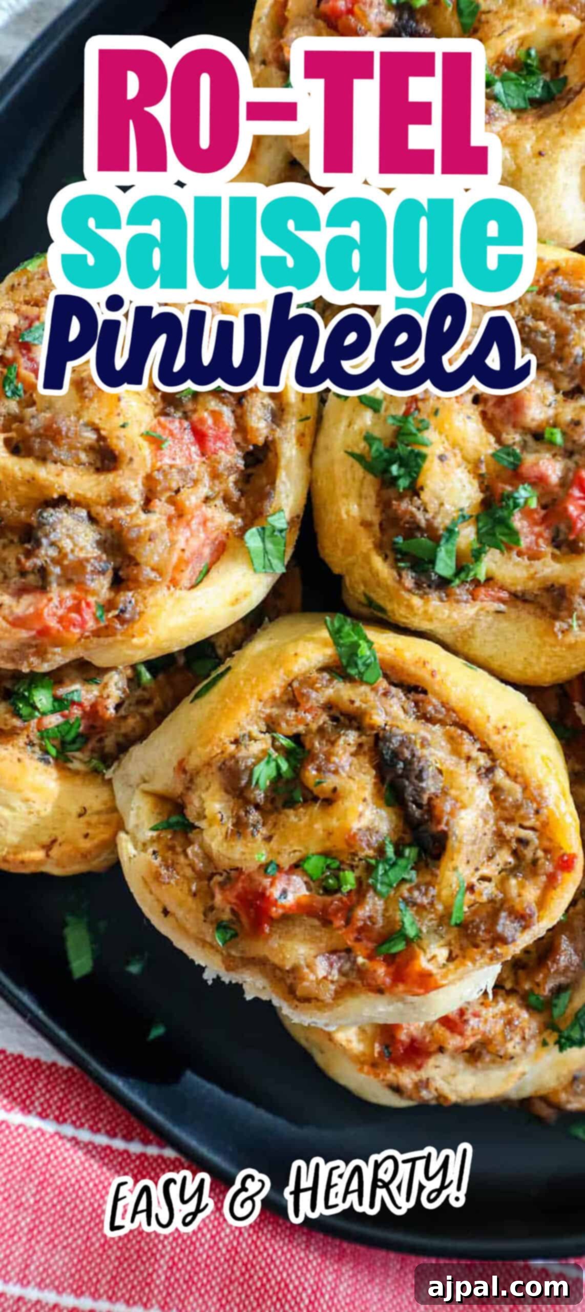 Baked sausage cheese pinwheels on a plate, presented beautifully.