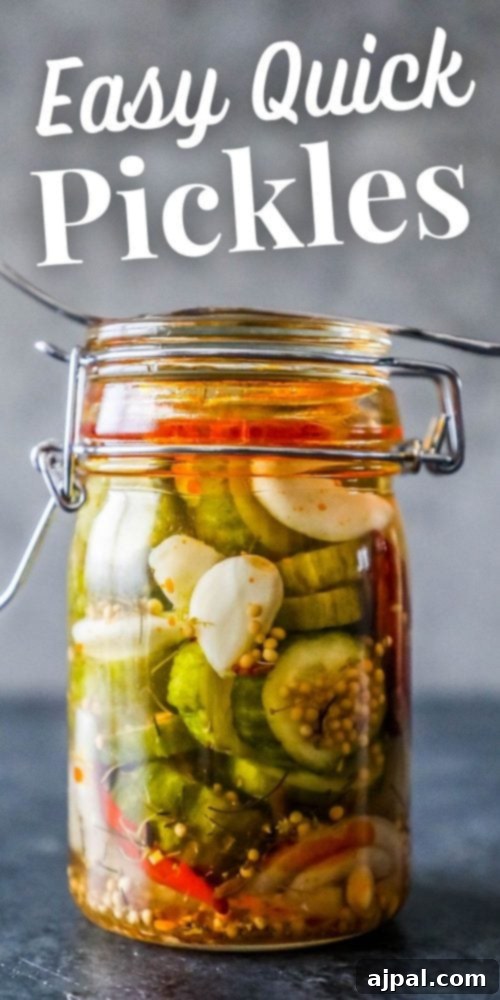 Quick Chill Pickles 6 A tall glass jar filled with fresh, easy, and quick refrigerator pickles, ready to be stored without canning.