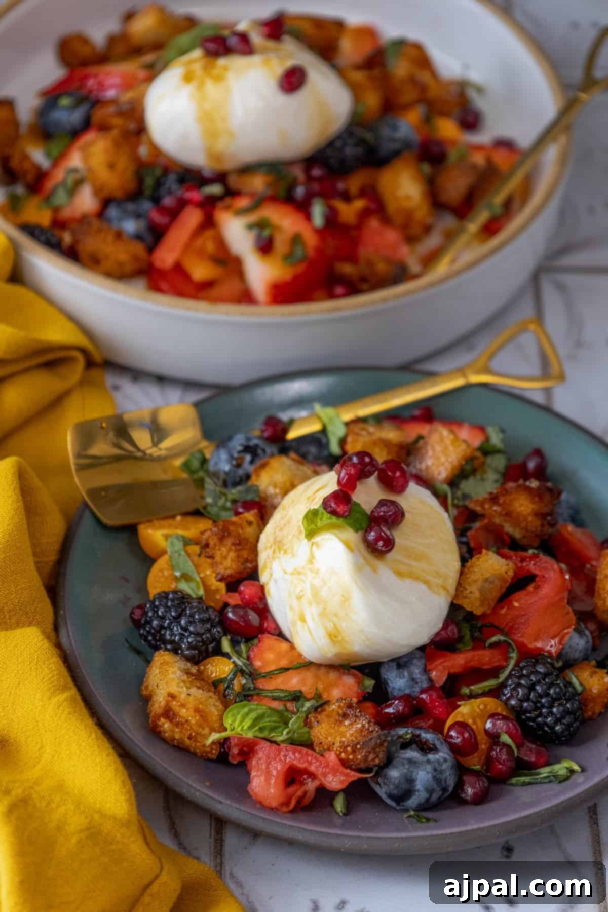Summer Berry Burrata Medley 14 A vibrant plate featuring perfectly roasted Brussels sprouts alongside a colorful medley of fresh berries, creating a delightful contrast.