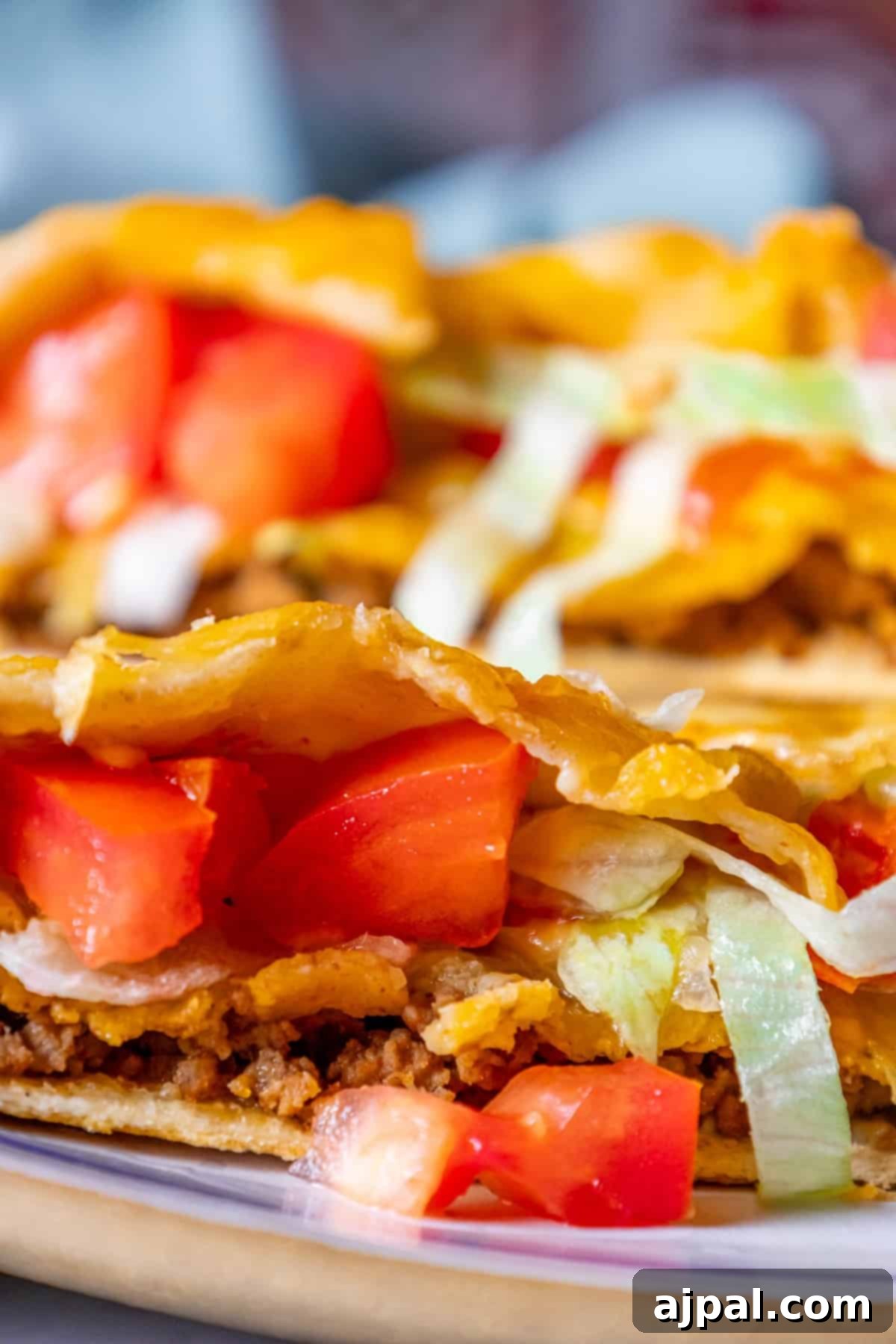 DIY Crunchwrap Delights 13 A homemade plate with two perfectly grilled Crunchwrap tacos on it, garnished with fresh herbs, ready to be enjoyed.