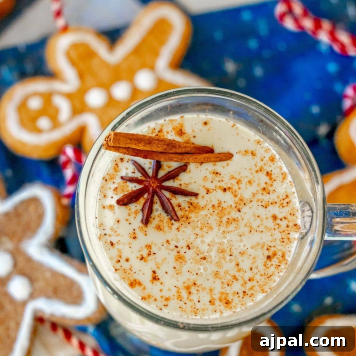 eggnog in a glass mug with nutmeg on top
