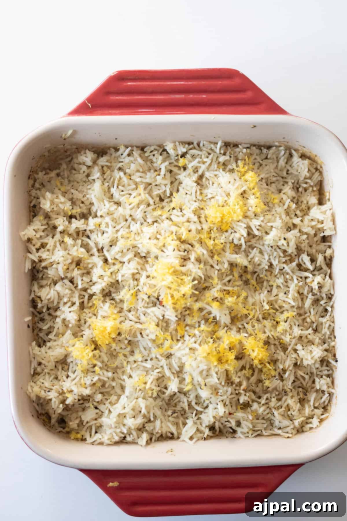 Baked lemon rice topped with lemon zest.