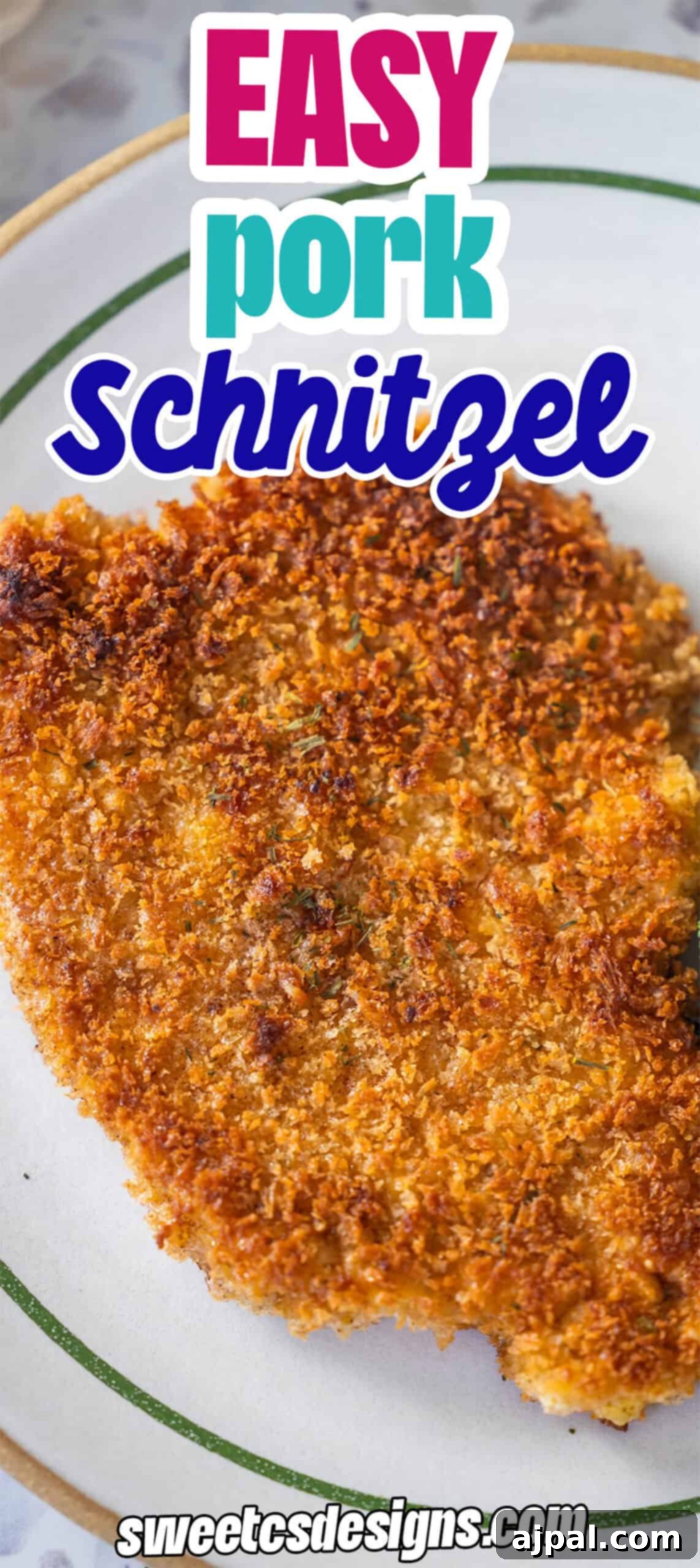 Pork Schnitzel: A Crispy, Golden Delight 19 A breaded and fried pork schnitzel on a white plate with a green rim; text reads "Easy Pork Schnitzel Recipe" and "sweetcsdesigns.com.